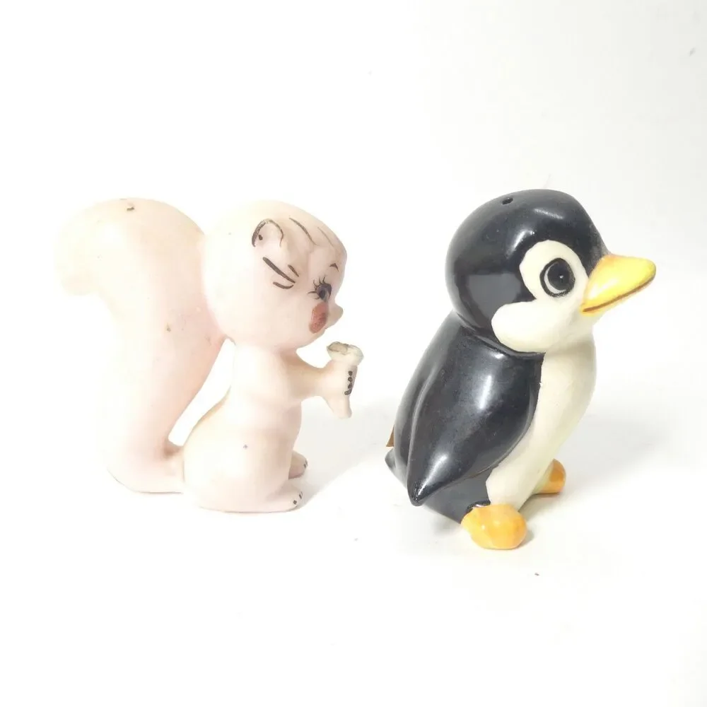 2 Norcrest Japan Salt Pepper Shakers Pink Skunk Squirrel + Penguin Vintage MCM